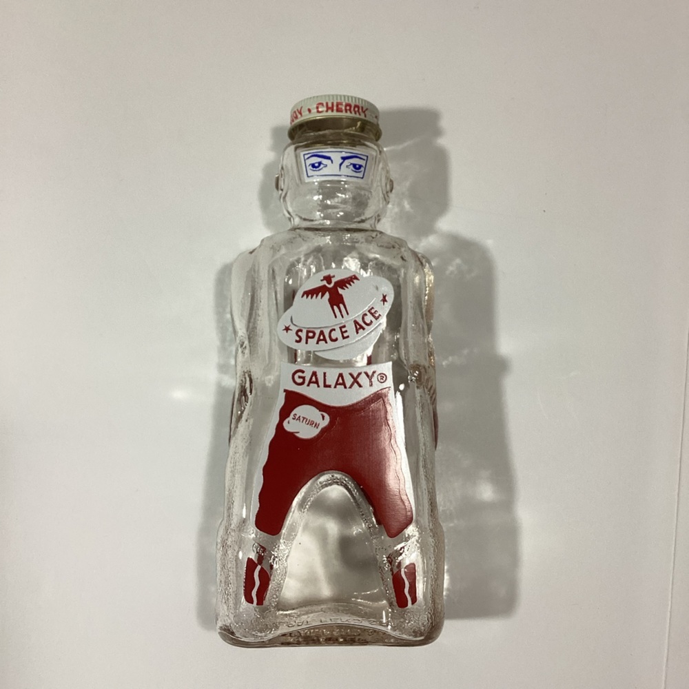 Vtg 50s Galaxy Spaceman bottle red space ace